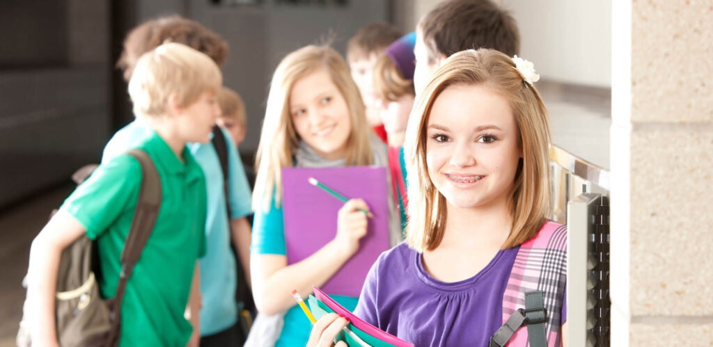 teen girl at school learns How to stop bullies