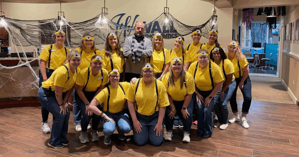 Wall Orthodontics team on Halloween, smiling in office, Invisalign in Statesboro, Tips for Halloween