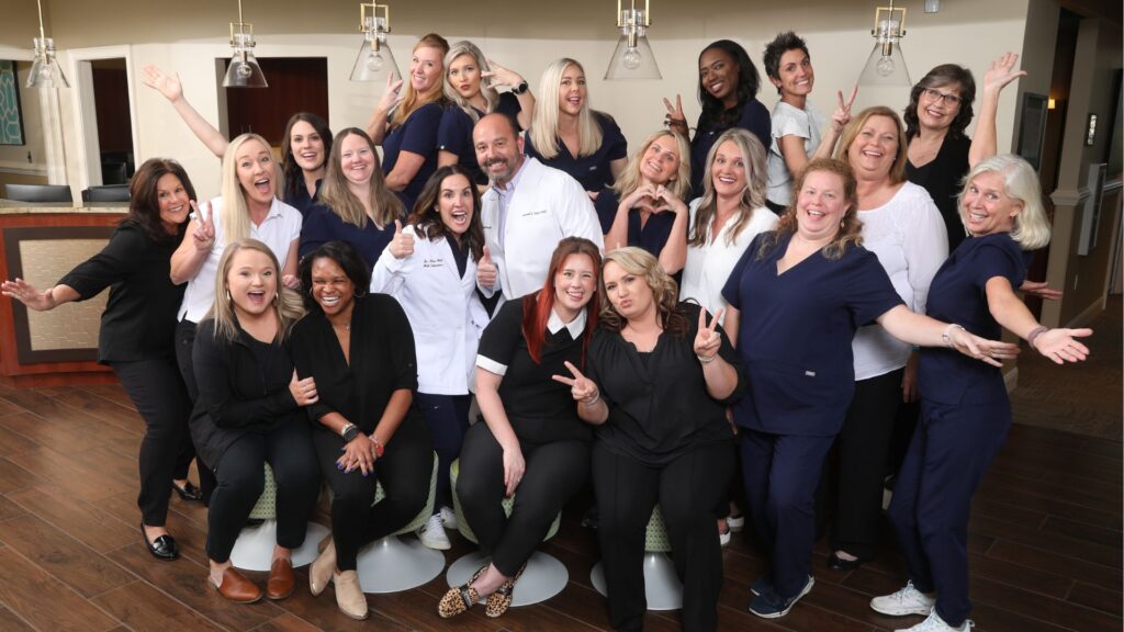 team celebrating Orthodontic Health Month